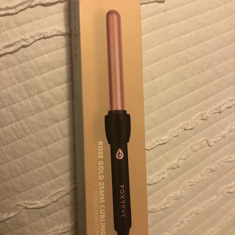 Brand new in box curling iron